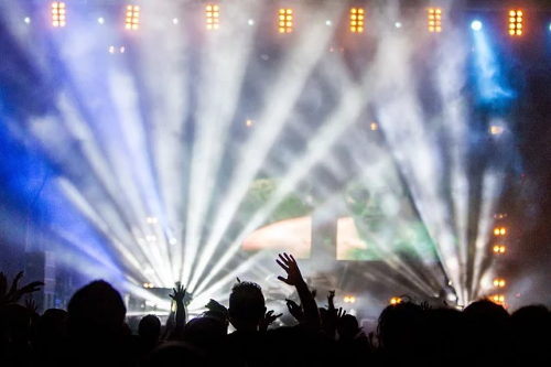 audience in front of a stage at concert